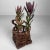 Exceptional Japanese hanakago (flower basket), crafted from naturally woven branches and vines, likely bamboo and...