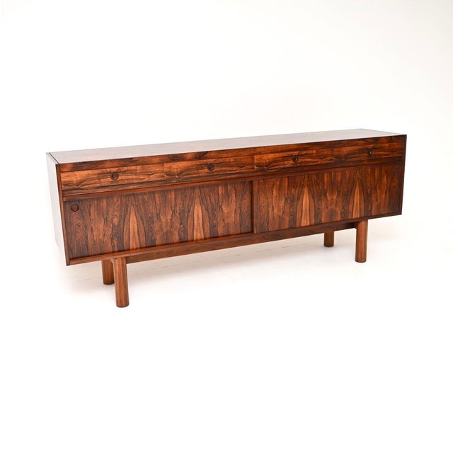 A stunning vintage sideboard by Robert Heritage for Archie Shine. This was made in England and originally retailed by...