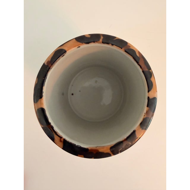 Charming small-scale Polish ceramic cachepot featuring hand-painted leopard spot motif in warm caramel, espresso, and...