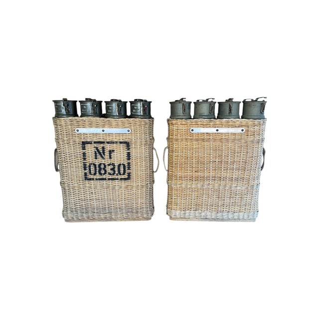 World War II wicker Canister holders with canisters. Used to carry artillery shells in the field. The Pair was hanging on...