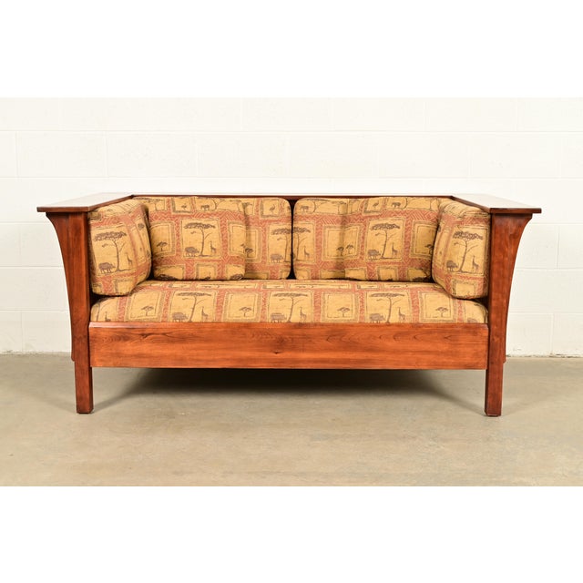 A gorgeous Mission, Arts & Crafts, or Prairie style spindle settle sofa or loveseat By Stickley USA, Circa Late 20th...