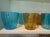 A gorgeous set of 9 authentic vintage Venini for Disaronno Turquoise and White fused striped Ice Buckets (5) and a set of...