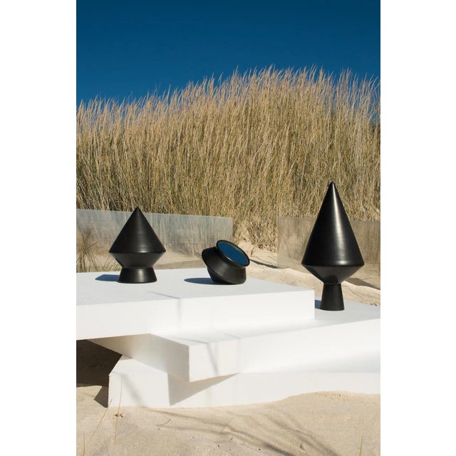 Fragments of a distant time, shaped by the hands and fire. Nero is an experiential interpretation of the ceramic technique...