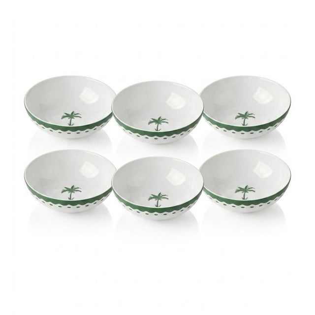This exquisite set of six small porcelain bowls comes from the highly coveted, limited-edition collaboration between Fern...