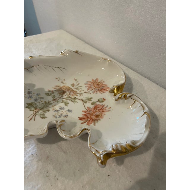 Carl Tielsch Altwasser 1845 porcelain handled serving dish in the rococo taste. White porcelain ground with gold gilded...