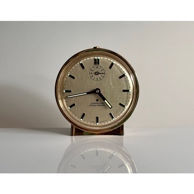 This elegant early edition model 'Trivox Silentic' table clock in modernist design was produced by the quality...