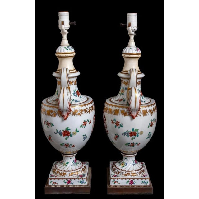 Pair of Chinese Export Style Armorial Porcelain Two Handled Vases Mounted as Table Lamps, 20th century, each decorated...