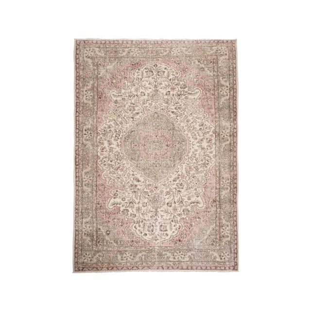 A vintage Turkish rug, finely hand knotted, low wool pile on cotton foundation. Deep washed. Sturdy and can be used on a...