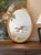 This large Baroque gold ornate frame with a 1 inch beveled mirror is a classic example of a French ribbon bow mirror. The...