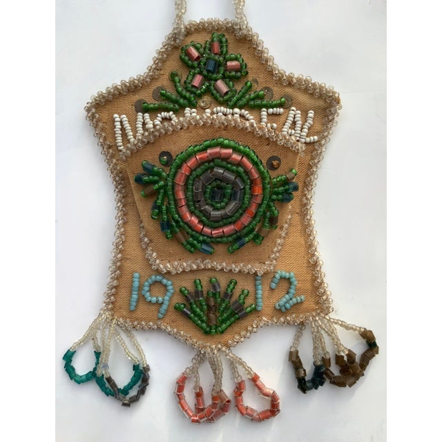 Iroquois made 1912 beaded Montreal wall pocket originally made for the tourist trade. Total height is 11.5 with beaded...