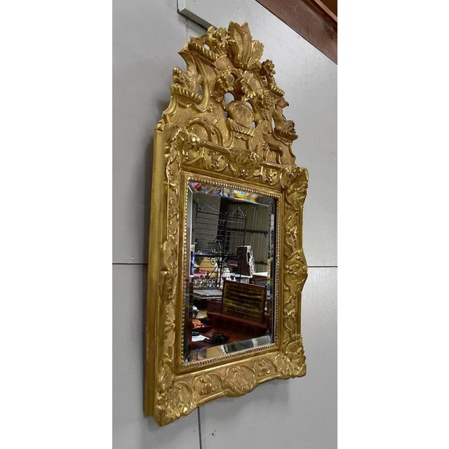 Small Wall Mirror Golden Wood, Regency style. The Ice Rectangular and in perfect condition, sees its perimeter beveled. It...
