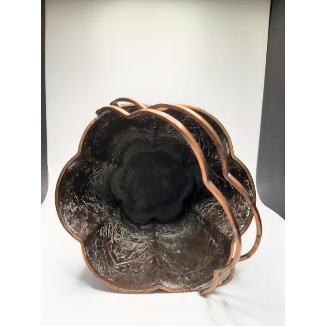 **19th Century Repoussé Copper Nepal Scallop Bucket** This exquisite scallop-shaped bucket dates back to the late 1800s...