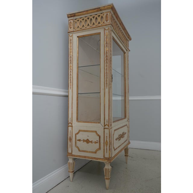 Age: Approx: 100 Years Old Details: Adjustable Shelves Find Carved Details High Quality Construction Lighted Interior...