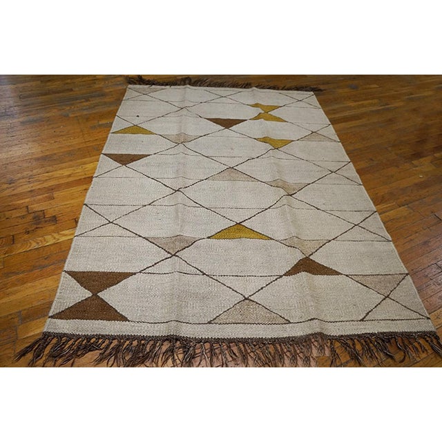 Antique Art Deco - European Small Scatter Size Wool Ivory Rug, Circa Date: 1930s. This exceptional antique rug embodies...