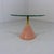 Lovely Itralian side table. Cone shaped foot of pink solid natural stone, Brushed brass stand and a thick glass table top....