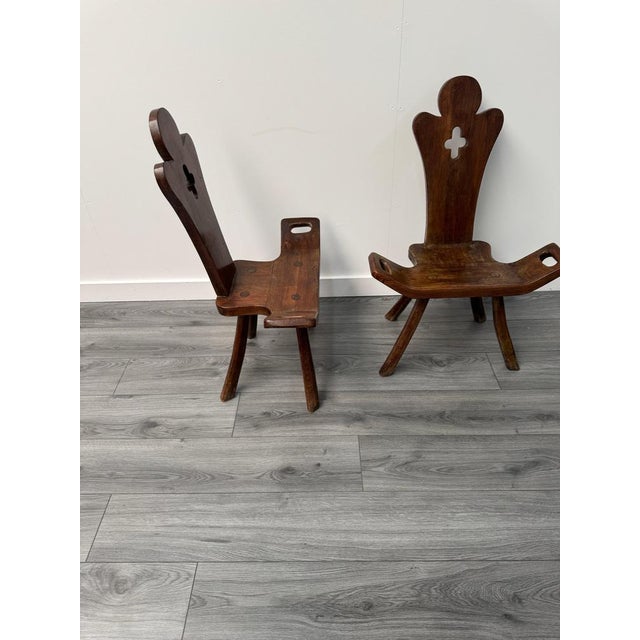 A charming pair of Spanish arts & crafts occasional chairs handmade entirely from solid oak with beautiful carving...