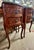 Vintage 1920s French-style end tables with ornate carvings on drawers. Three drawers in working condition. Can be used as...