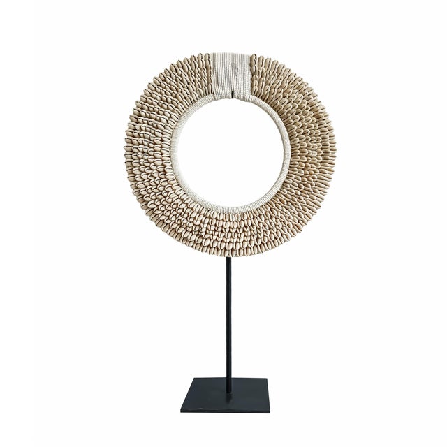 A male necklace from the Asmat Village, Papua New Guinea. Large Money Cowrie shells (used in earlier times as currency)...