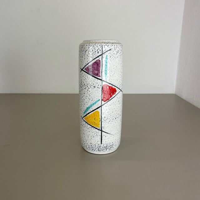 Article: Fat lava art vase Producer: Scheurich, Germany Decade: 1970s This original vintage vase was produced in the 1970s...