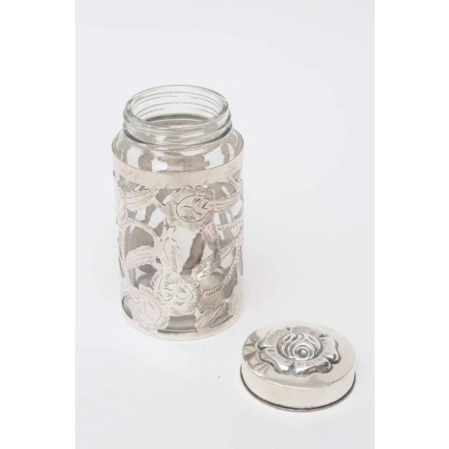 The vintage sterling silver design overlay over the clear glass makes this container or vessel perfect for serving or many...