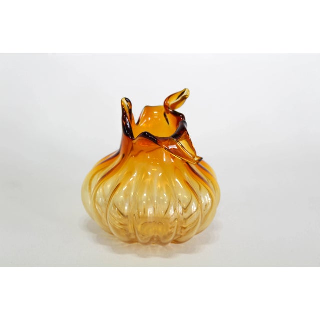 Vintage Deco vase in amber color glass Dimension; 7" Diameter x 7" Height See pictures and condition for reference If you...