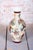 This ceramic vase is an absolutely breathtaking and highly decorative showcase of Far Eastern artistry from the early 20th...