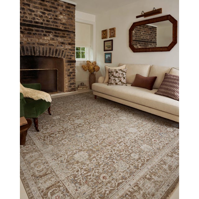 The Ida Collection from Chris Loves Julia x Loloi is a vintage-inspired area rug with a soft, subtly textured pile similar...