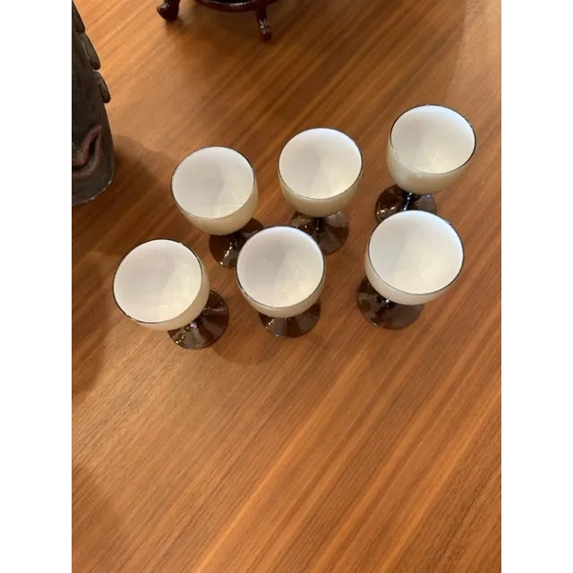 This is a set of 6 Carlo Moretti Cased Stemware glasses. They have a sable color with a white interior. Perfect for an...