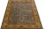 This is a beautiful modern Tabriz-style hand-knotted wool rug with a gray field. It has a golden brown frame, olive green...