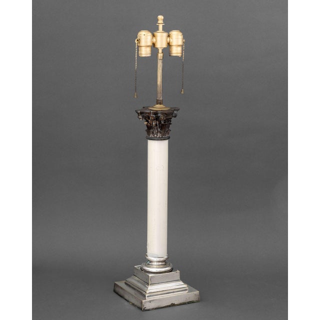 Neoclassical Corinthian Column Form Table Lamp, two light sockets surmounting bronzed metal ornate capital, white-painted...