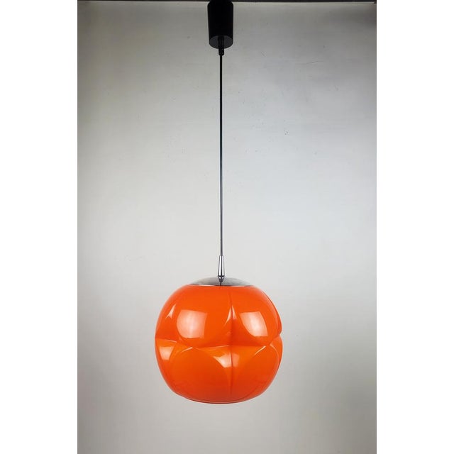 The "artichoke" pendant lamp, an original by the renowned german manufacturer peill & putzler, is a design icon from the...