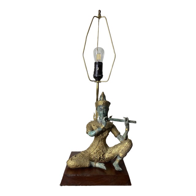 Vintage Asian James Mont Style Gilt Metal Asian Deity Lamp. For Sale