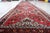 A Rare Tribal Runner from North‑West Persia This handmade antique Persian Malayer runner rug was woven in the Malayer...
