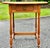 Great little side or accent table originally used as a writing table. Crafted in walnut. A full width dovetailed drawer...