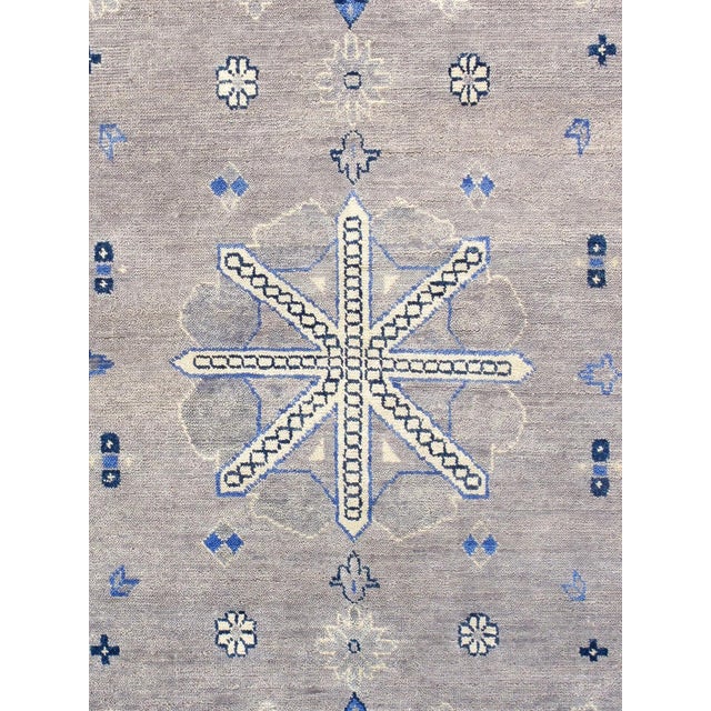 Khotan hand-knotted rugs are quite unique folk artifacts which display elements of rich, historical cultures. These rugs...