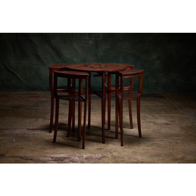 Louis Majorelle Art Nouveau nesting tables set of 5 with intricate floral marquetry inlay on the largest round table top,...