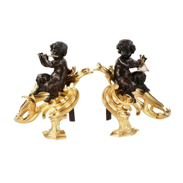 Pair of firewood cabinets in chiseled, gilded and patinated bronze, decorated with figures of musician fauns seated on...