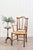 This Arts & Crafts armchair showcases carved, scalloped back slats and a solid elm frame with handwoven rush seats. The...