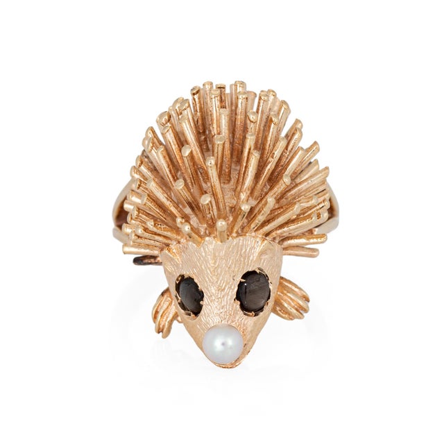 Finely detailed vintage Hedgehog ring crafted in 14k yellow gold (circa 1970s). One small 3mm cultured pearl adorns the...