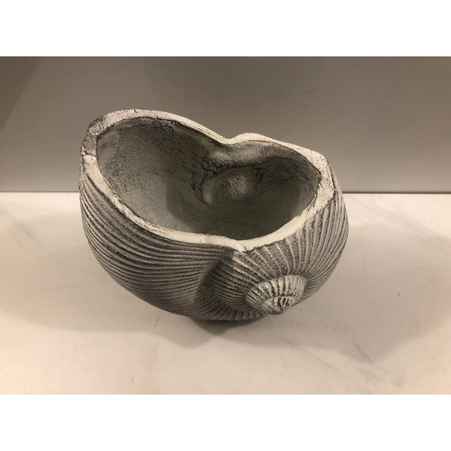 This eye catching Vintage Whitewashed Brass Nautical Seashell Planter will be a lovely and unique addition to your...