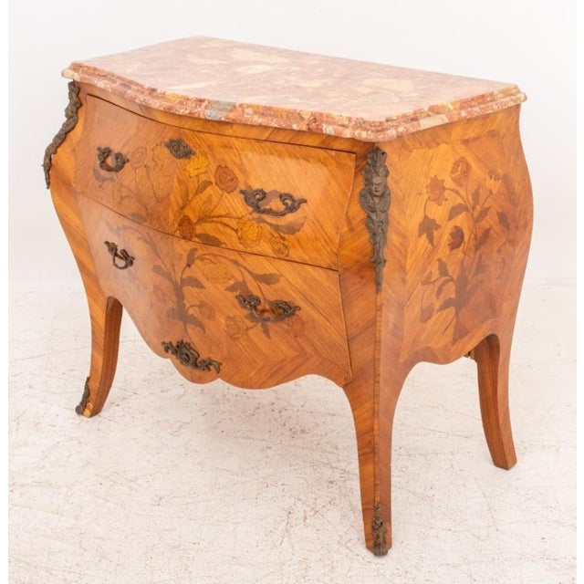 Louis XV Style Marble Top Rosewood Marquetry Bombe Chest of Drawers, with floral motif on the two curved drawers, raised...