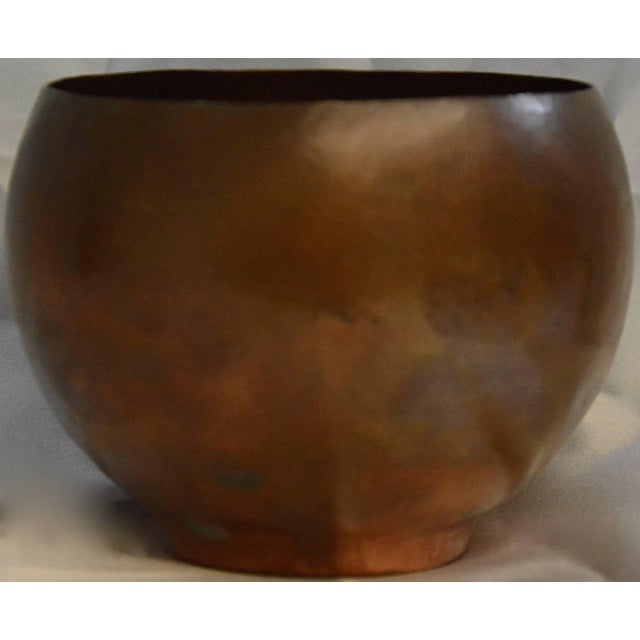 This is a Classic piece of vintage artisan décor with a copper finish. This is a 1940s hand-wrought copper tone metal...