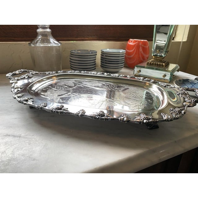 Here we have a beautiful antique Victorian silver plate footed serving tray. This was made in America by Meriden Britannia...