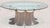 Bring timeless tropical sophistication into your home with this exceptional vintage pencil reed rattan dining table from...