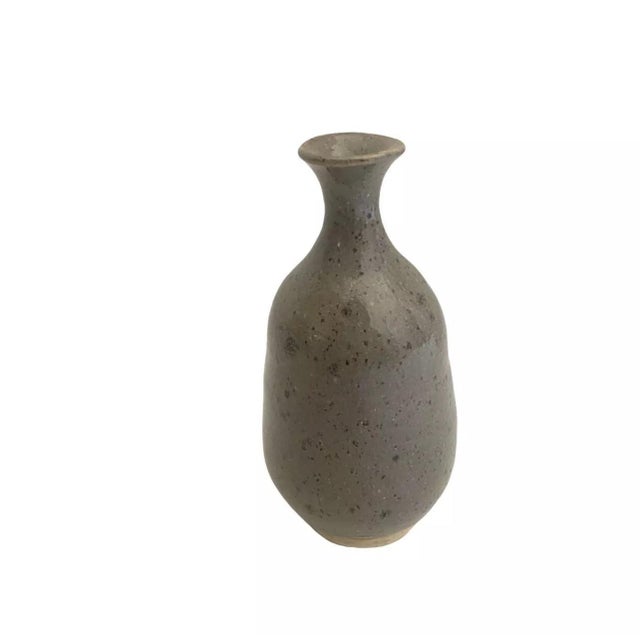 we have for your consideration a very beautiful mid century modern studio art pottery. this piece of pottery consists of a...