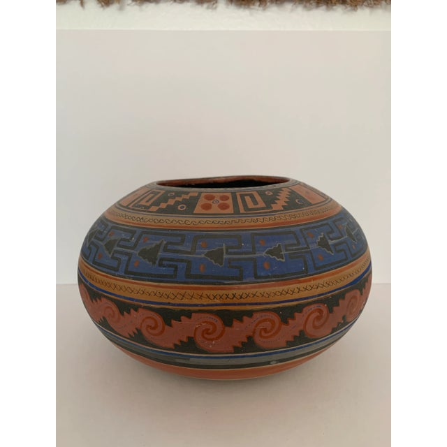 Stunning hand-painted Mexican vessel with beautiful adornment. Subtle dye in a graphic diamond pattern. Could be used as a...
