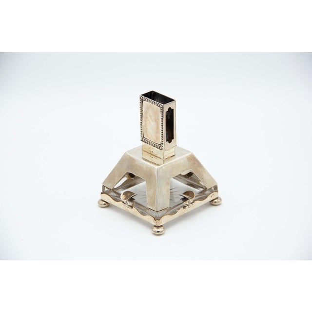 Silver Ashtray with Square Glass Base, in Very Good conditions. Designed 1890 to 1919 This piece has an attribution mark,...