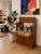 Mid Century Modern Teak bar cabinet that transforms from a compact cabinet into a fully equipped entertaining station. The...