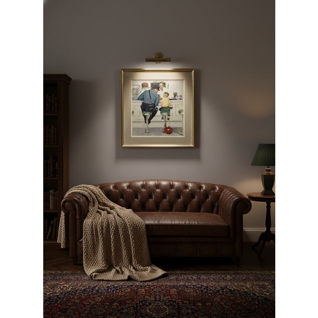 This is a professionally framed print of the famous Norman Rockwell painting "The Runaway". The original oil on canvas...