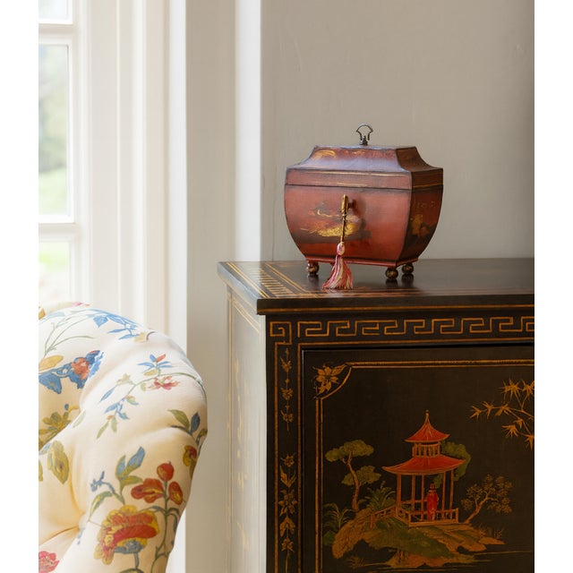 A stunning antique French Empire Period red tole sarcophagus shaped tea caddy box in a Chinoiserie style with original...